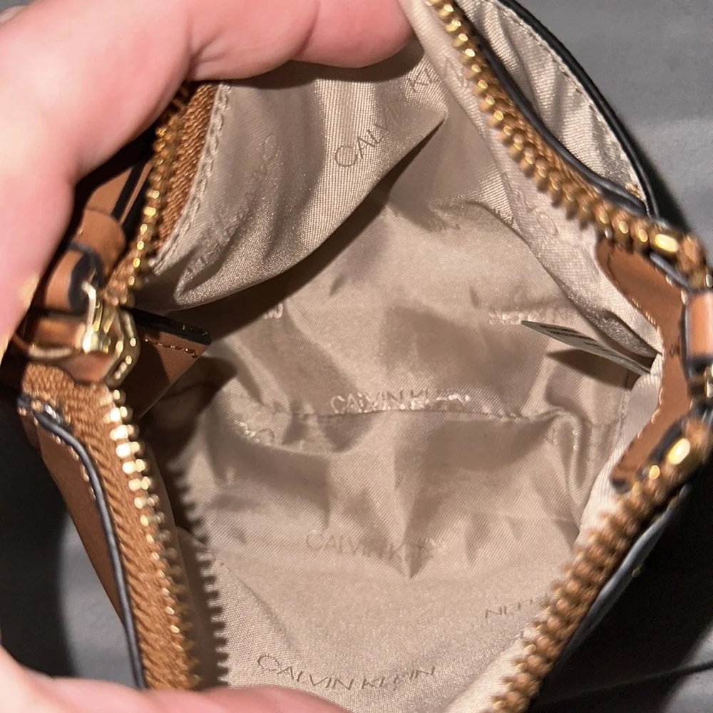 NWOT Calvin Klein camel color tan small bag can put wristlet has pocket in fron